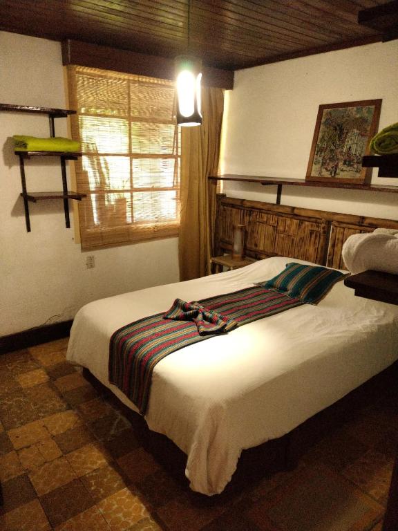 Postel nebo postele na pokoji v ubytování Hotel Casa Chapultepec