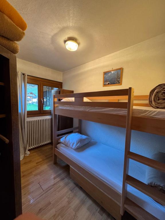 Postel nebo postele na pokoji v ubytování L'Ardesia