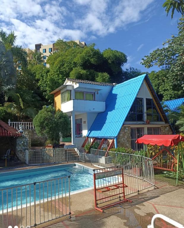 Bazén v ubytování QUINTA PRIVADA Jamani Melgar nebo v jeho okolí