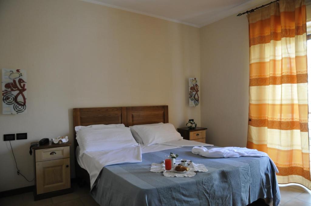 Postel nebo postele na pokoji v ubytování Hotel Fly