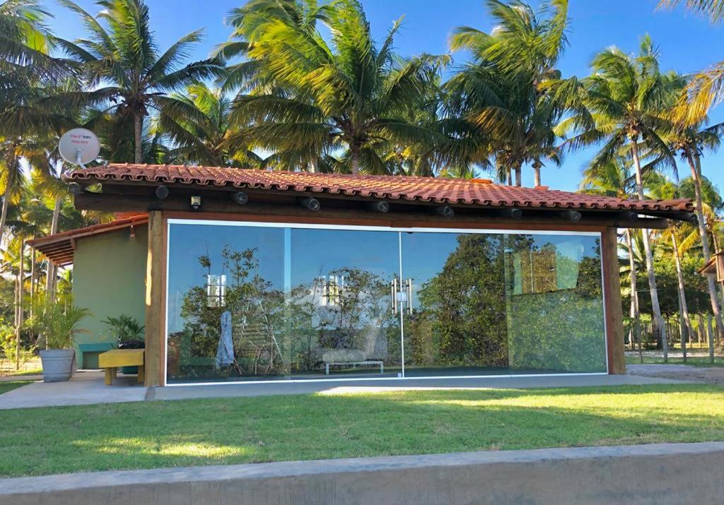 Zahrada ubytování Casa Verde, beira da água com 2 suítes - Mar Doce!