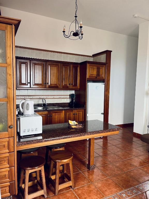 Kuchyň nebo kuchyňský kout v ubytování Apartamentos Los Verodes