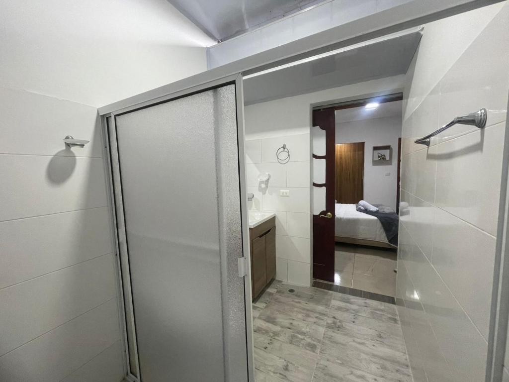 Een bed of bedden in een kamer bij Hostal los profes
