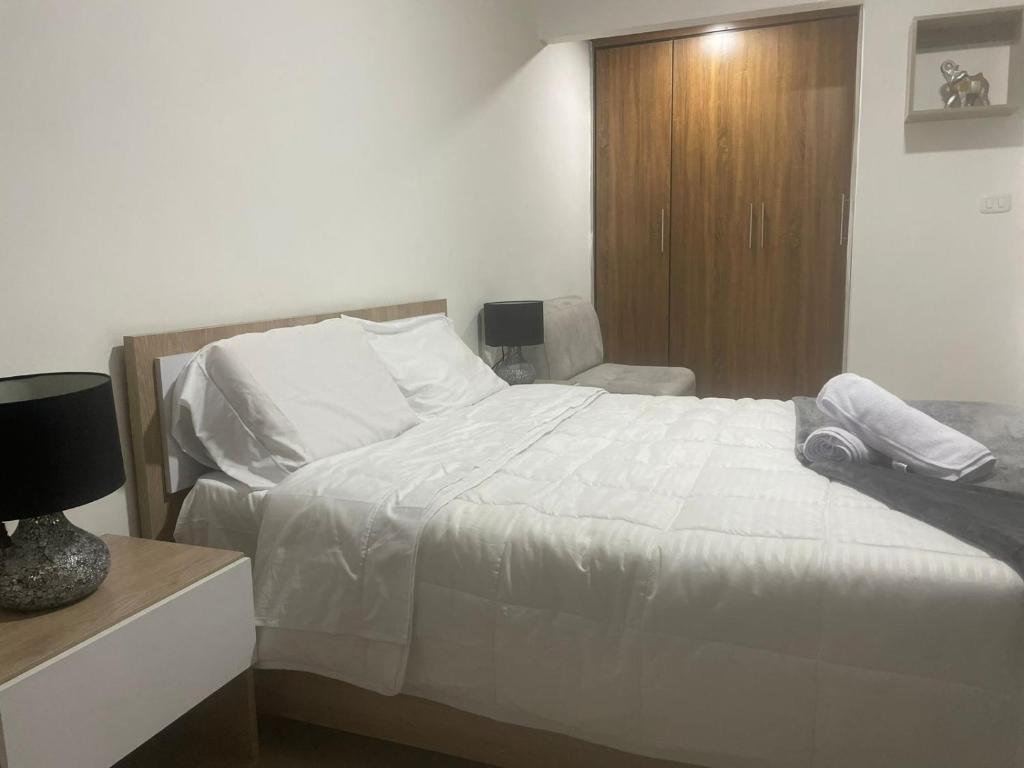 Een bed of bedden in een kamer bij Hostal los profes