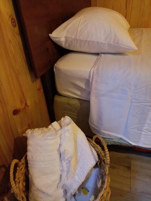 Cama o camas de una habitación en Cabaña Entre Arrayanes Número 2