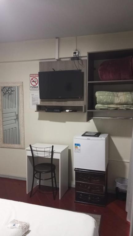 Kuchyň nebo kuchyňský kout v ubytování Rocha's Hotel