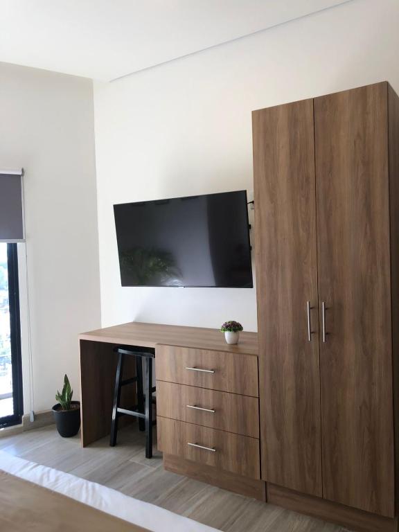 TV a/nebo společenská místnost v ubytování Casa Cacho