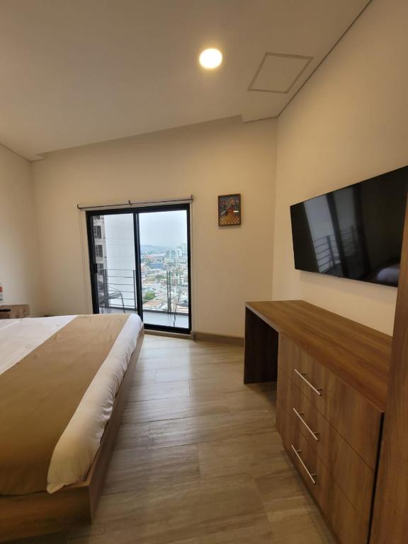 TV a/nebo společenská místnost v ubytování Casa Cacho