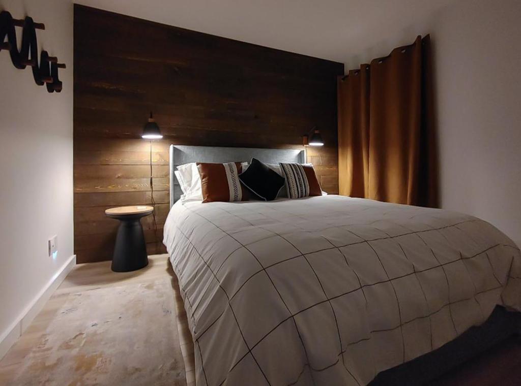 Postel nebo postele na pokoji v ubytování Chalet Aventure Orford