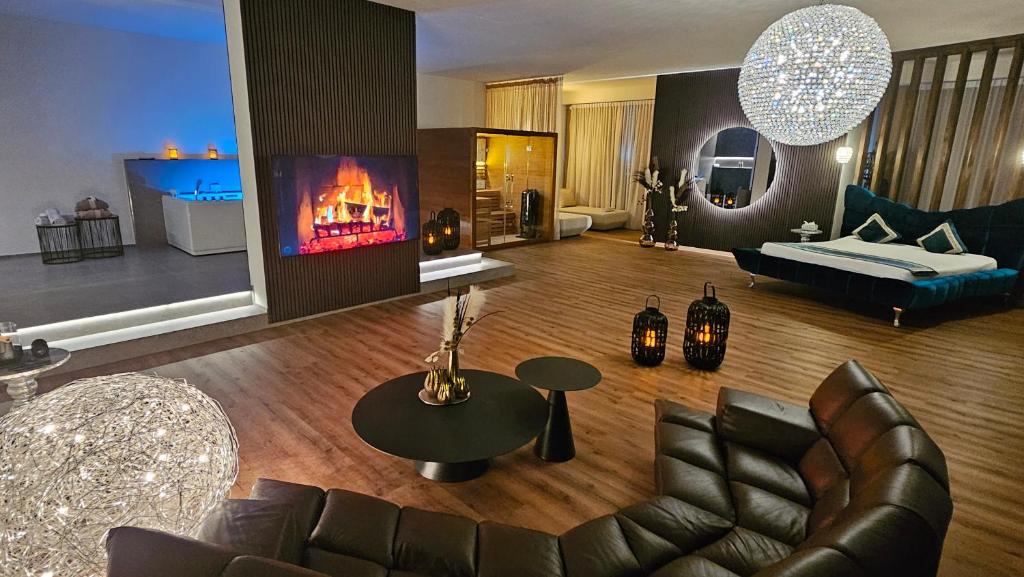 Istumisnurk majutusasutuses Privat-Spa mit Whirlpool und Sauna in Sursee