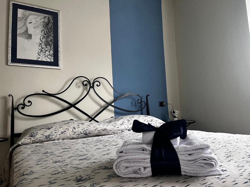 Postel nebo postele na pokoji v ubytování Ca d Rita