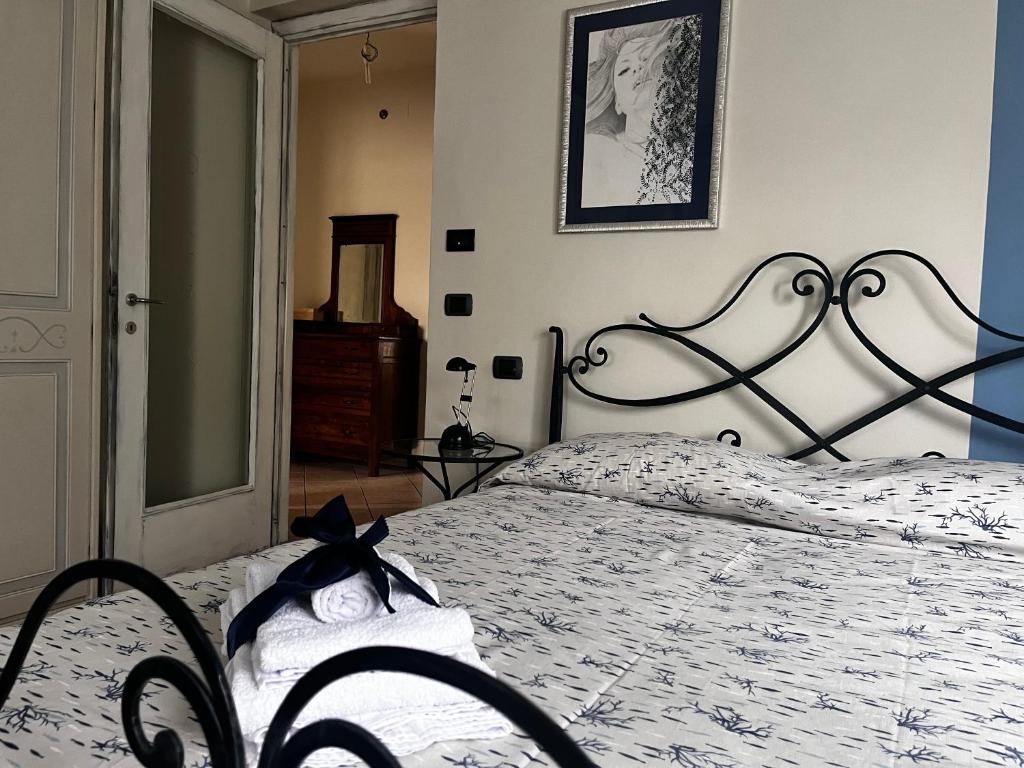 Postel nebo postele na pokoji v ubytování Ca d Rita