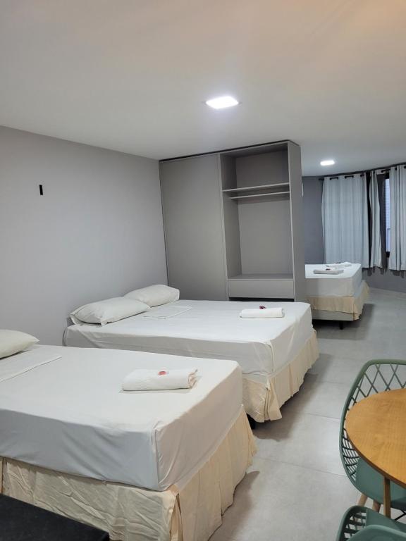 Ένα ή περισσότερα κρεβάτια σε δωμάτιο στο Victory Flat&Hotel
