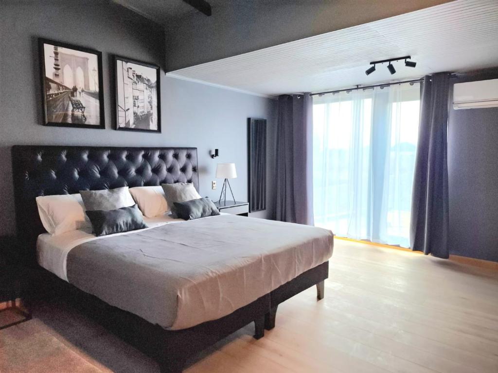 Postel nebo postele na pokoji v ubytování Hotel Boutique 501