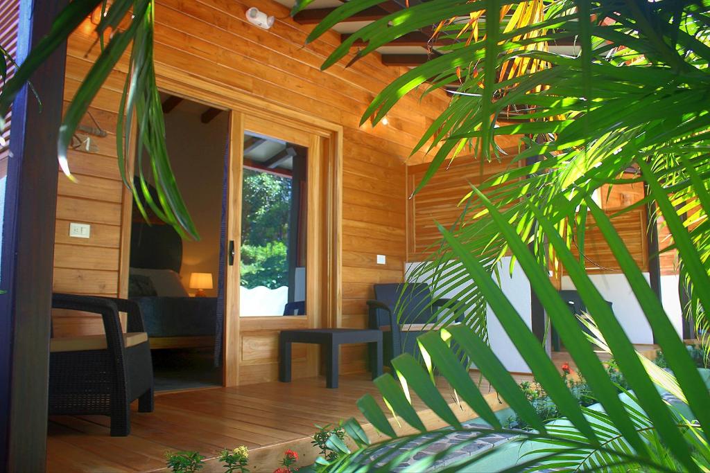 Zahrada ubytování Tiki Lodge Hotel de Charme