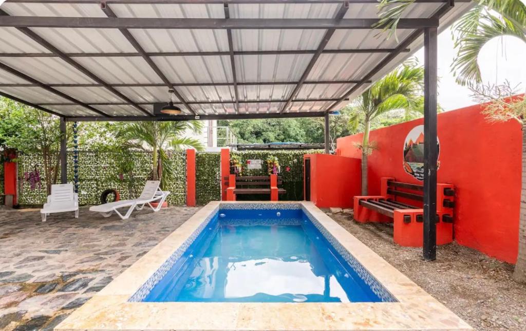 Bazén v ubytování Cabaña Don Tobo Jarabacoa RD nebo v jeho okolí