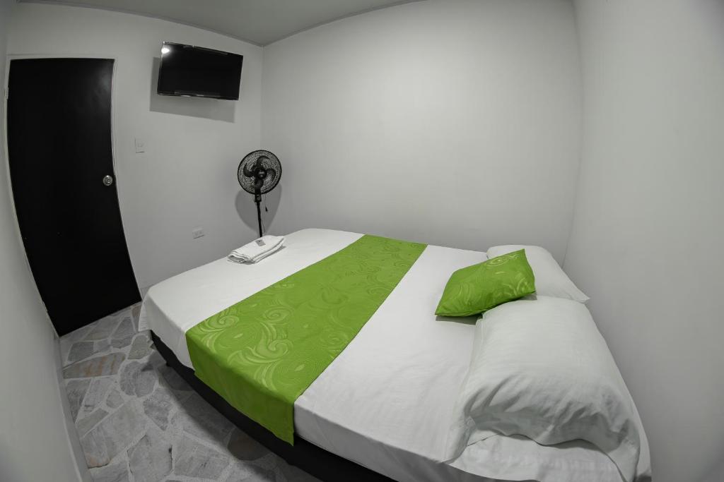 Postel nebo postele na pokoji v ubytování Hotel Santander Express