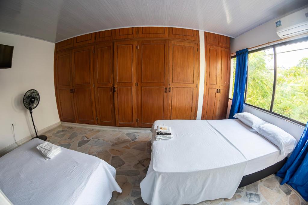 Postel nebo postele na pokoji v ubytování Hotel Santander Express