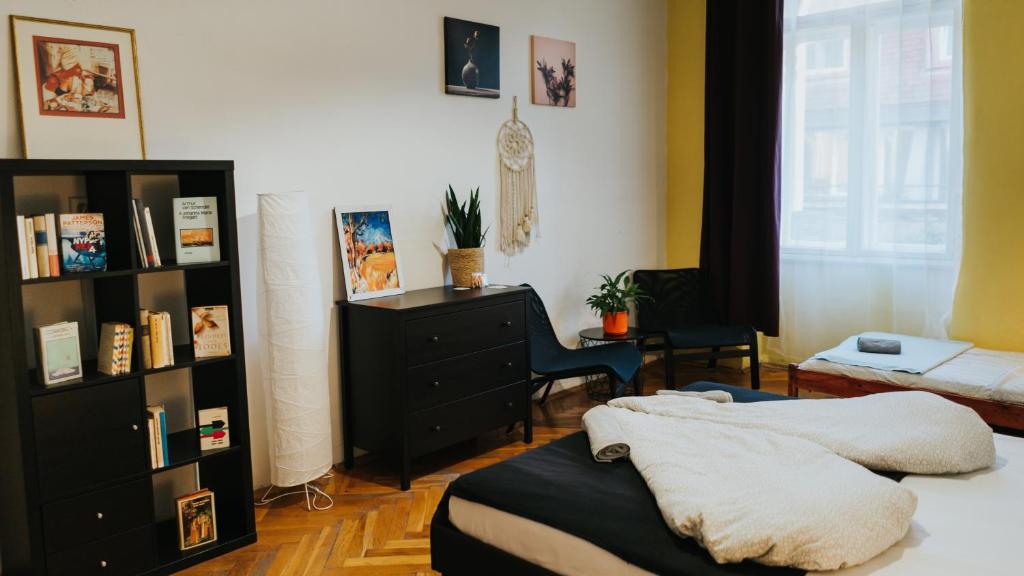 Postel nebo postele na pokoji v ubytování Nap Hostel Pécs