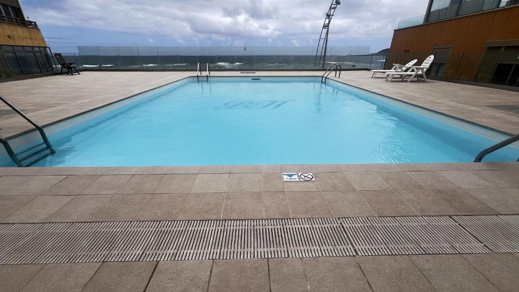 Vivienda vacacional en primera linea de playa y vistas al Mar y Piscina