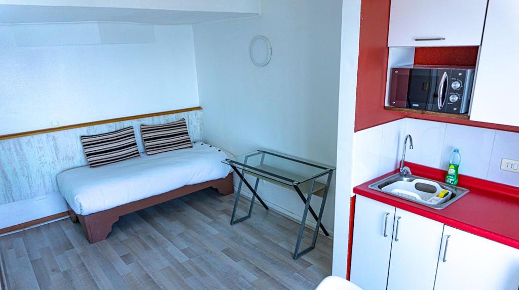 Kuchyň nebo kuchyňský kout v ubytování Dei Templi Apart Hotel