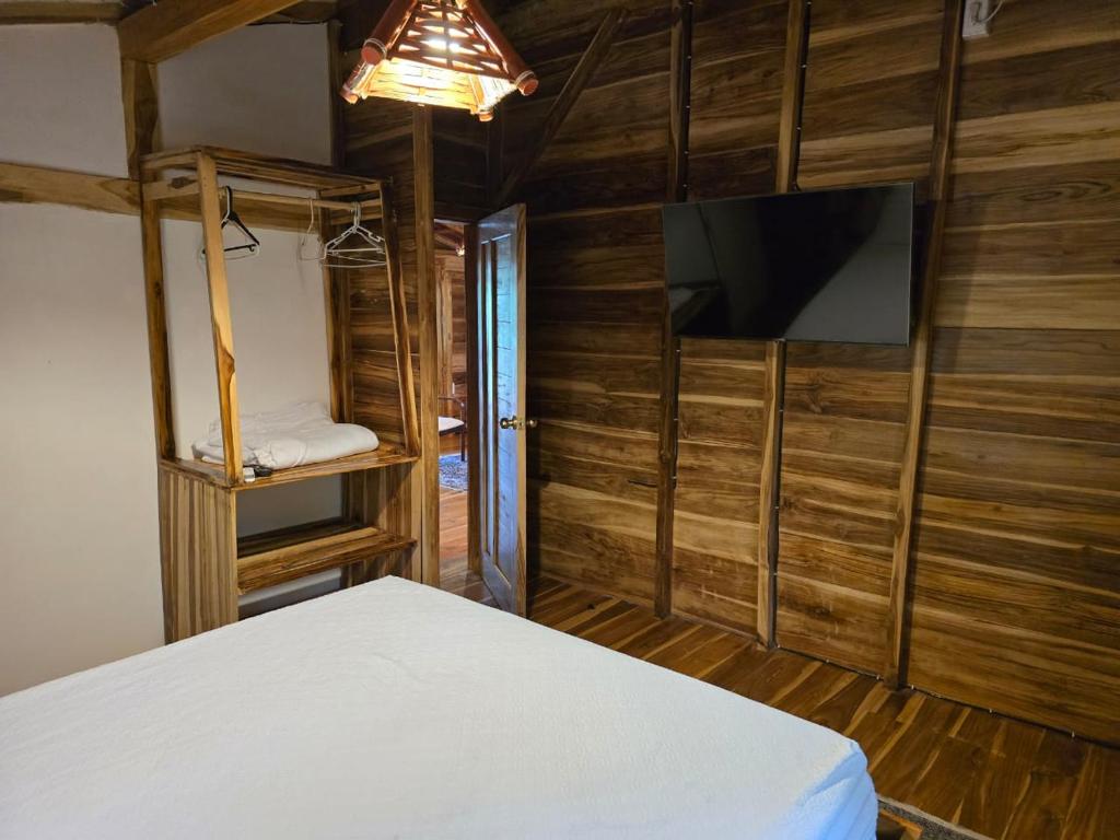 Postel nebo postele na pokoji v ubytování Nueva Tierra