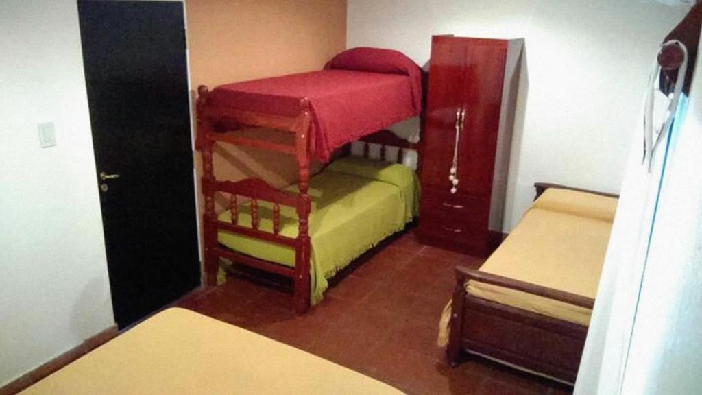 Postel nebo postele na pokoji v ubytování Casitas de Campo Wara kusi