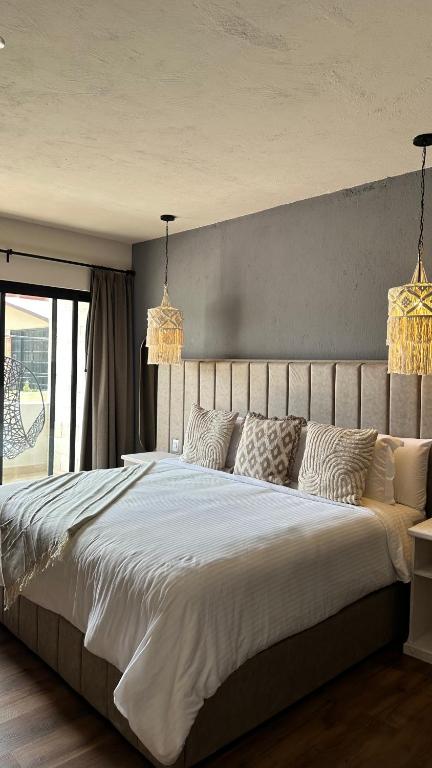 Postel nebo postele na pokoji v ubytování Altamonte Hotel Boutique