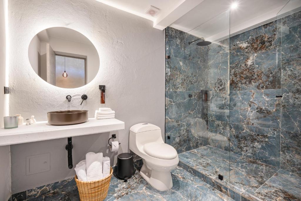 Koupelna v ubytování Nago Hometel Boutique