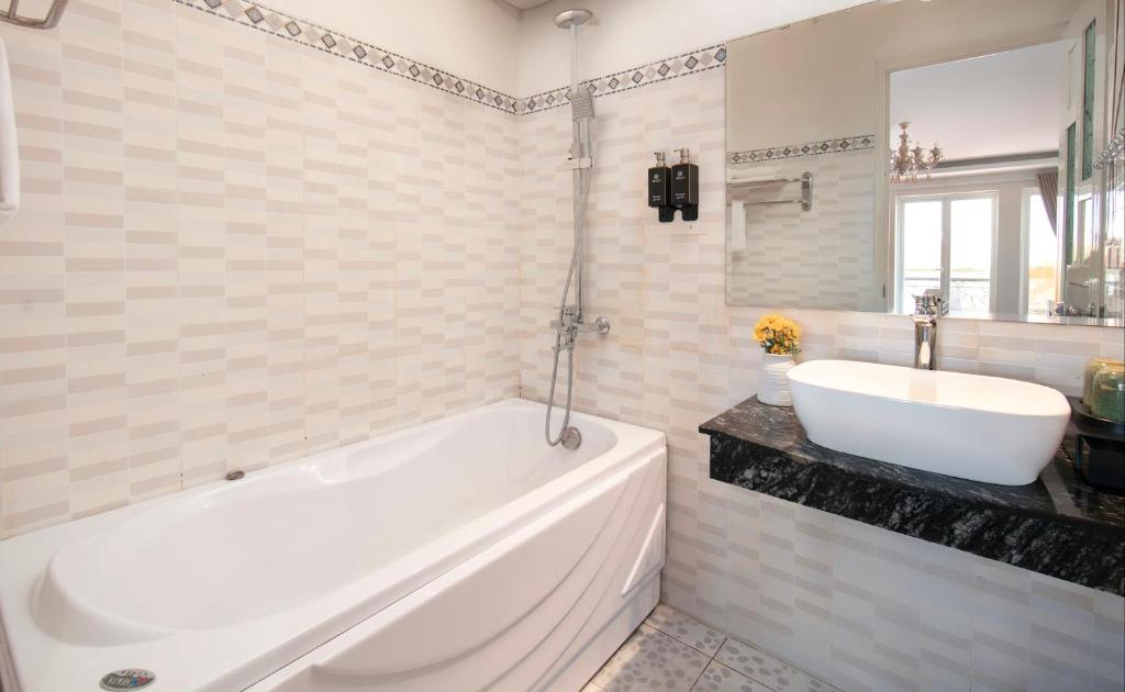 Koupelna v ubytování Delica Premium Hotel