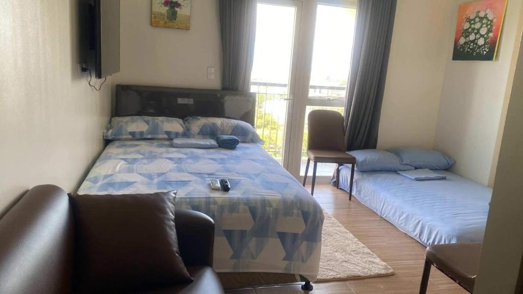 Postel nebo postele na pokoji v ubytování Zykes Condo at Saint Dominique