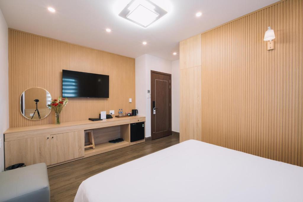TV a/nebo společenská místnost v ubytování HOANG LINH PHAT HOTEL