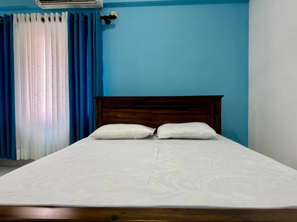 Postel nebo postele na pokoji v ubytování Havelock City Hostel, Colombo