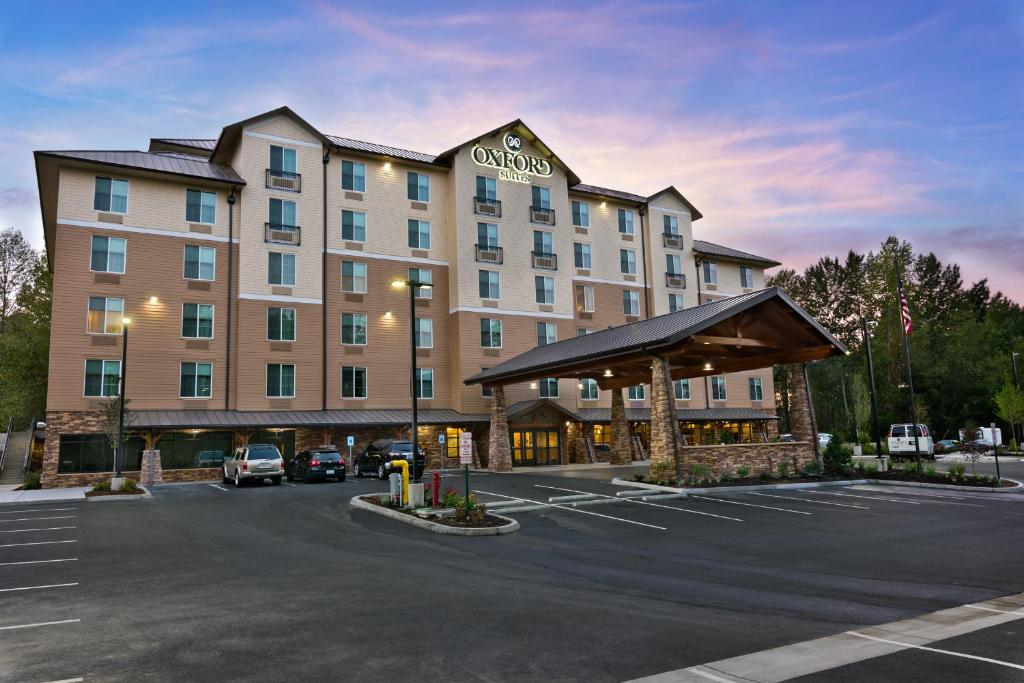 a rendering of a hotel with a parking lot at Oxford Suites Bellingham in Bellingham
