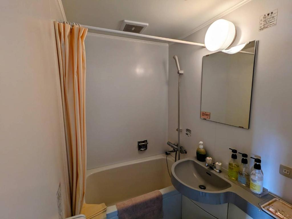 Koupelna v ubytování Madarao Kogen Hotel
