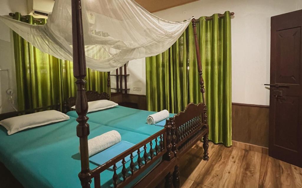 Postel nebo postele na pokoji v ubytování Reds Residency - Homestay