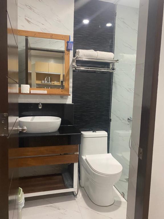 Koupelna v ubytování Madison Suites