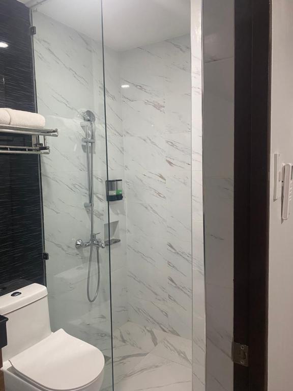 Koupelna v ubytování Madison Suites