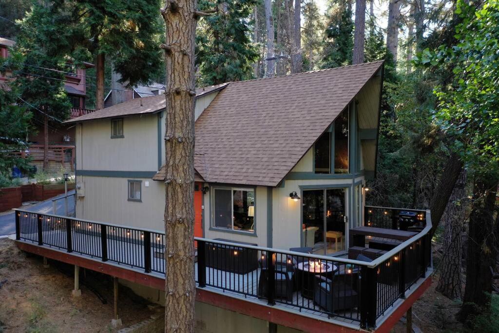 a small house in the middle of a forest at Fleming Creek Hideaway, Next to Creek, Fire-Pit! in Lake Arrowhead