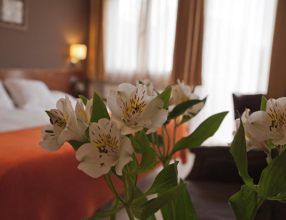Postel nebo postele na pokoji v ubytování Hotel & Spa Can Josep