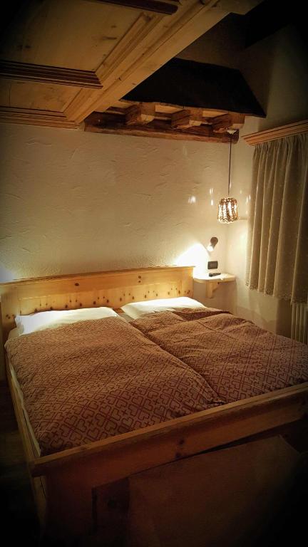 Postel nebo postele na pokoji v ubytování Historic Hotel Ristorante La Stua