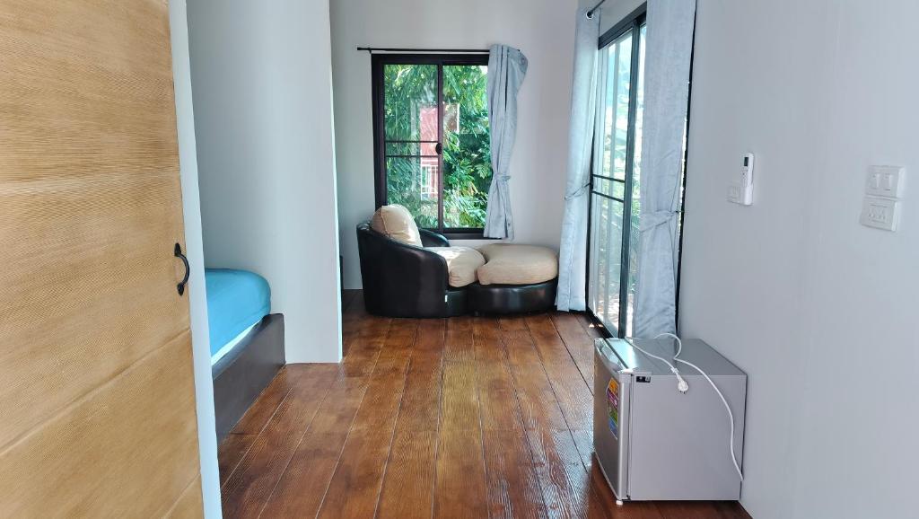Posezení v ubytování Na Na Doo Homestay