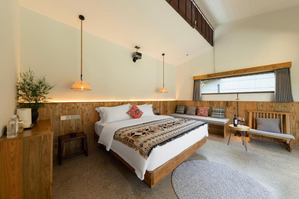 Postel nebo postele na pokoji v ubytování Wonderland Resort