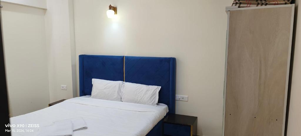 Postel nebo postele na pokoji v ubytování Telferk Acron Seawinds Apartment- Baga