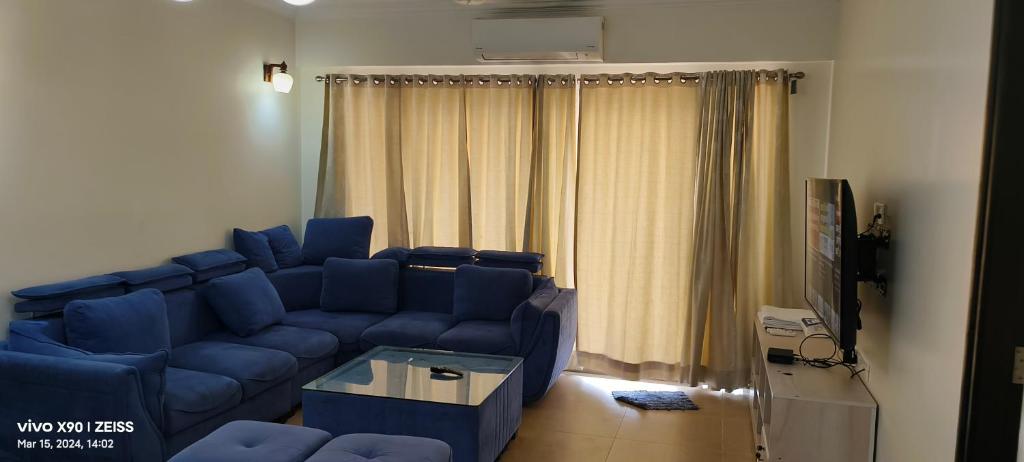 TV a/nebo společenská místnost v ubytování Telferk Acron Seawinds Apartment- Baga