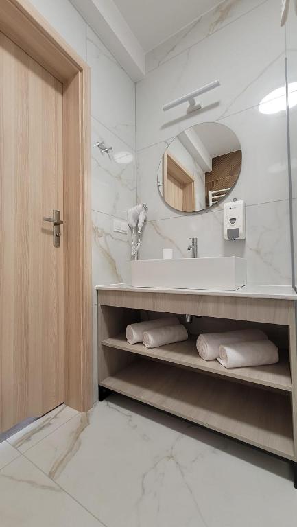 Koupelna v ubytování Hotel i Apartamenty Gorzelanny Dźwirzyno