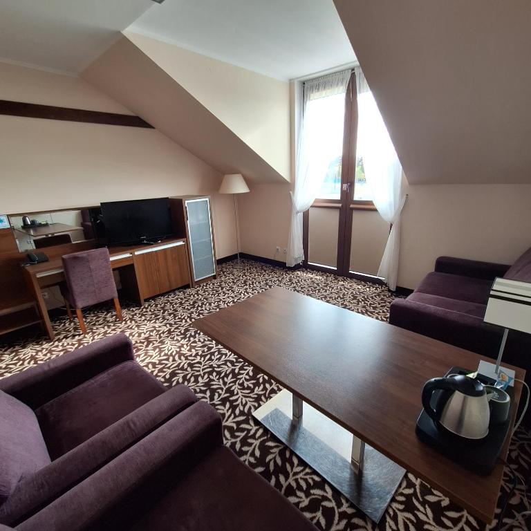 Posezení v ubytování Hotel i Aquapark Olender