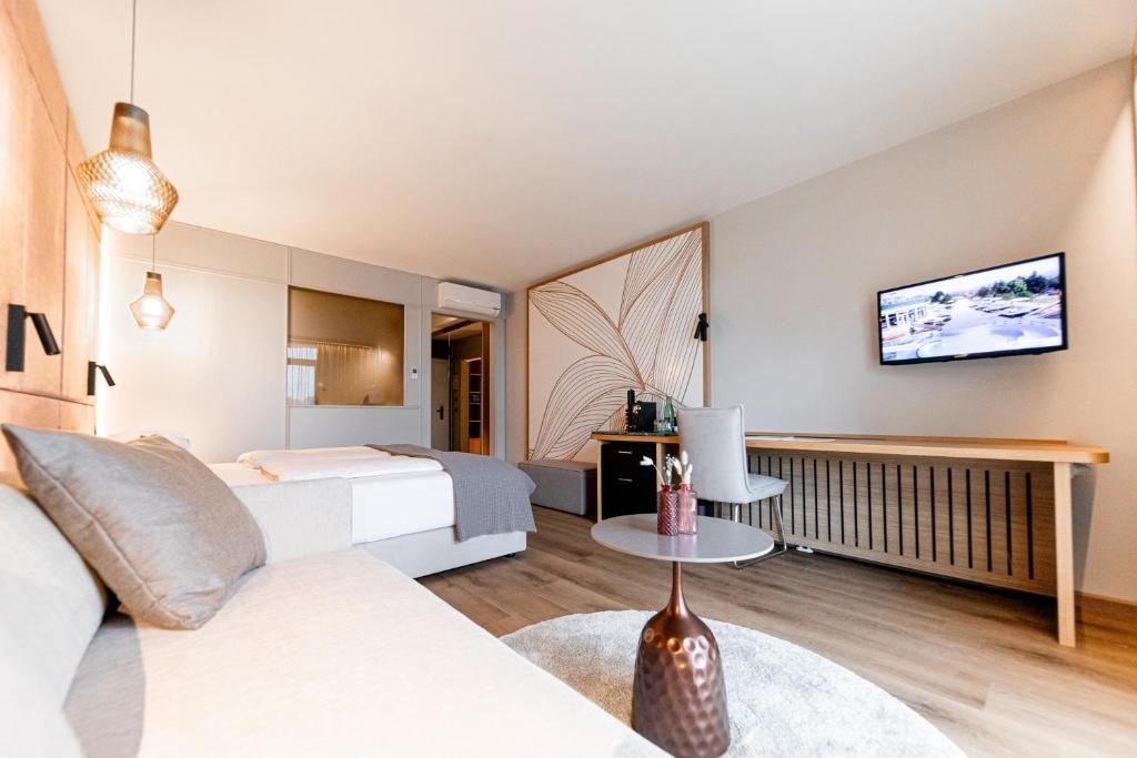 Postel nebo postele na pokoji v ubytování Avita Resort Bad Tatzmannsdorf