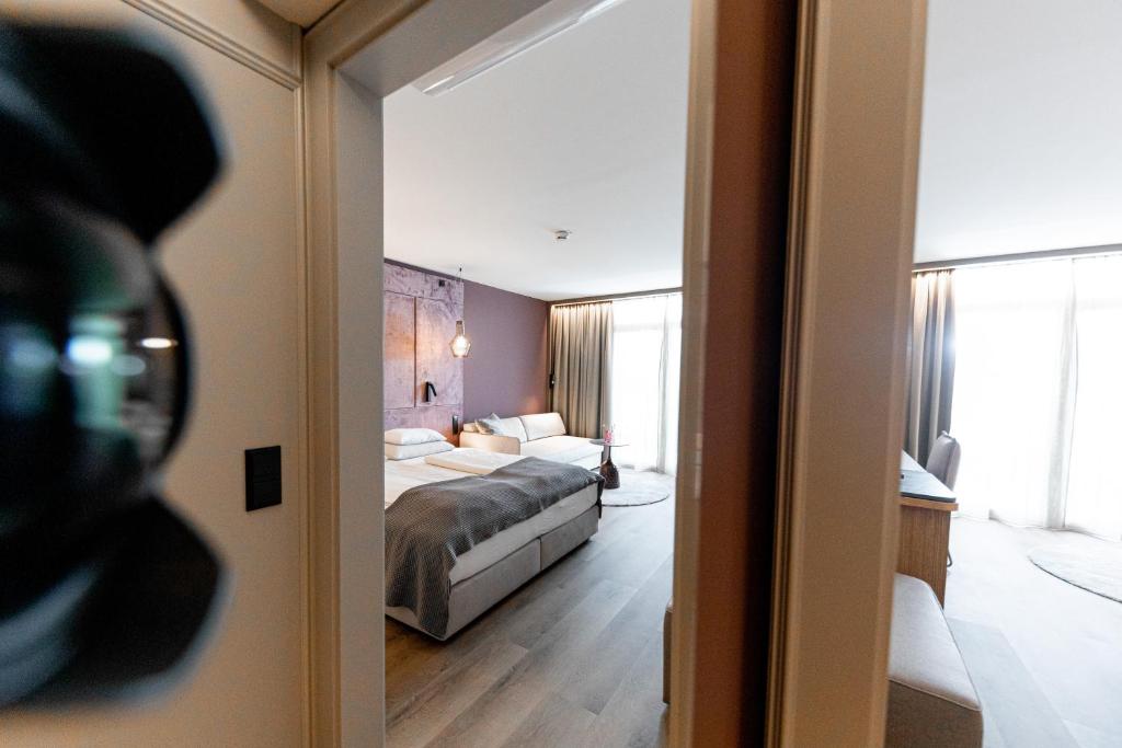 Postel nebo postele na pokoji v ubytování Avita Resort Bad Tatzmannsdorf