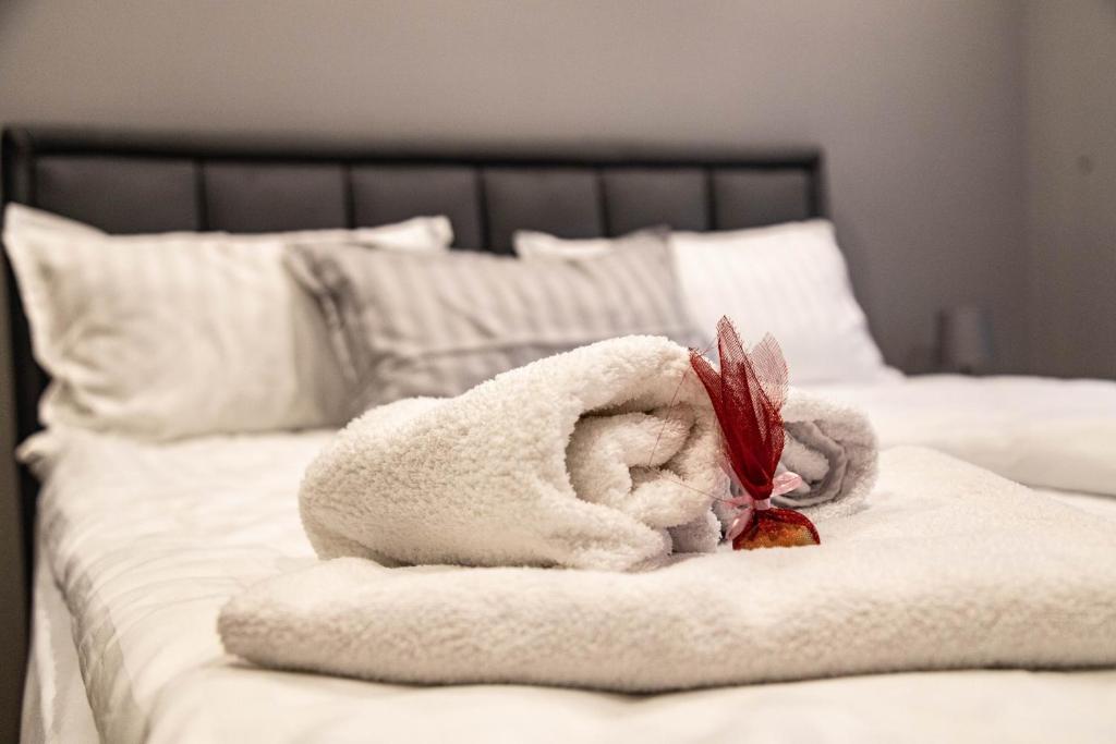Letto o letti in una camera di Liberte Apartments